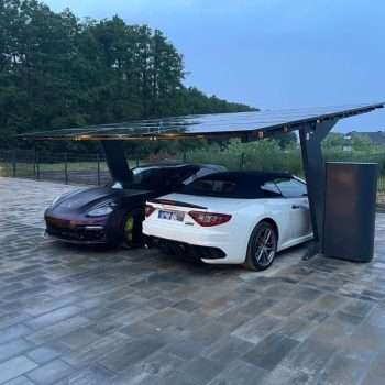 Products 21 solar carport with adjustable legs and integrated EV charging option.